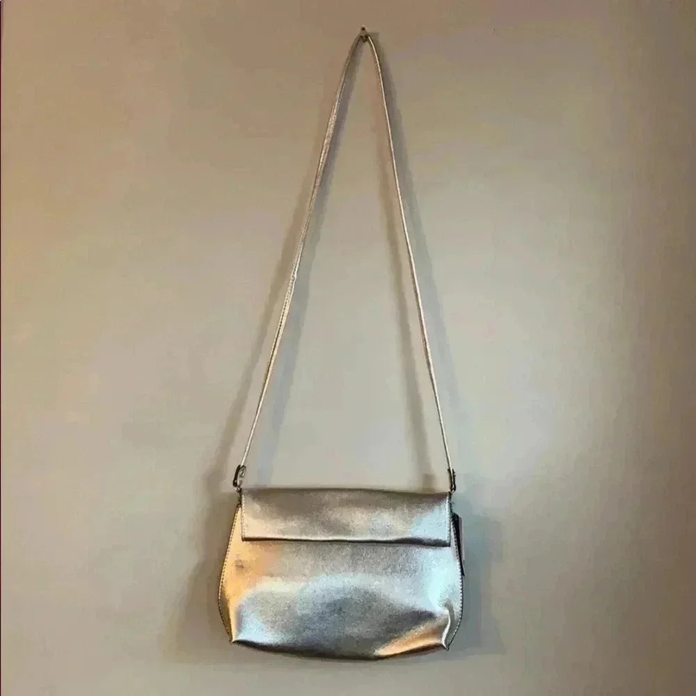 Urban Outfitters crossbody reversible bag.